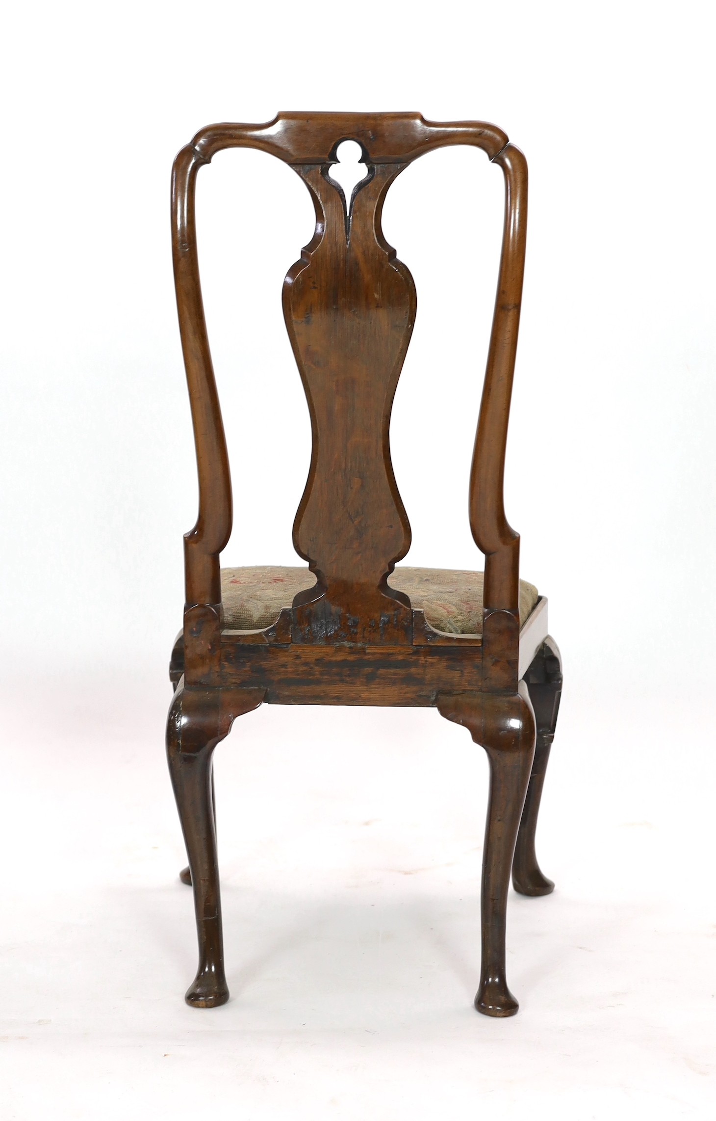 A pair of George I walnut and marquetry side chairs, c.1720, Restorations